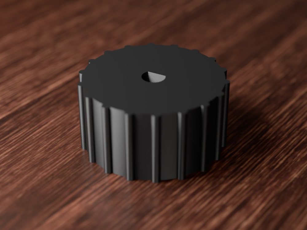 Yellow printed stove knob with grip ridges and a D-shaped shaft hole